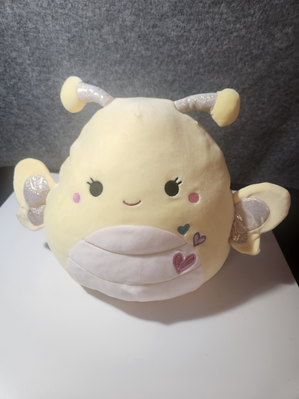 Nixie the Butterfly Squishmallow with Valentine's Day themed heart detail